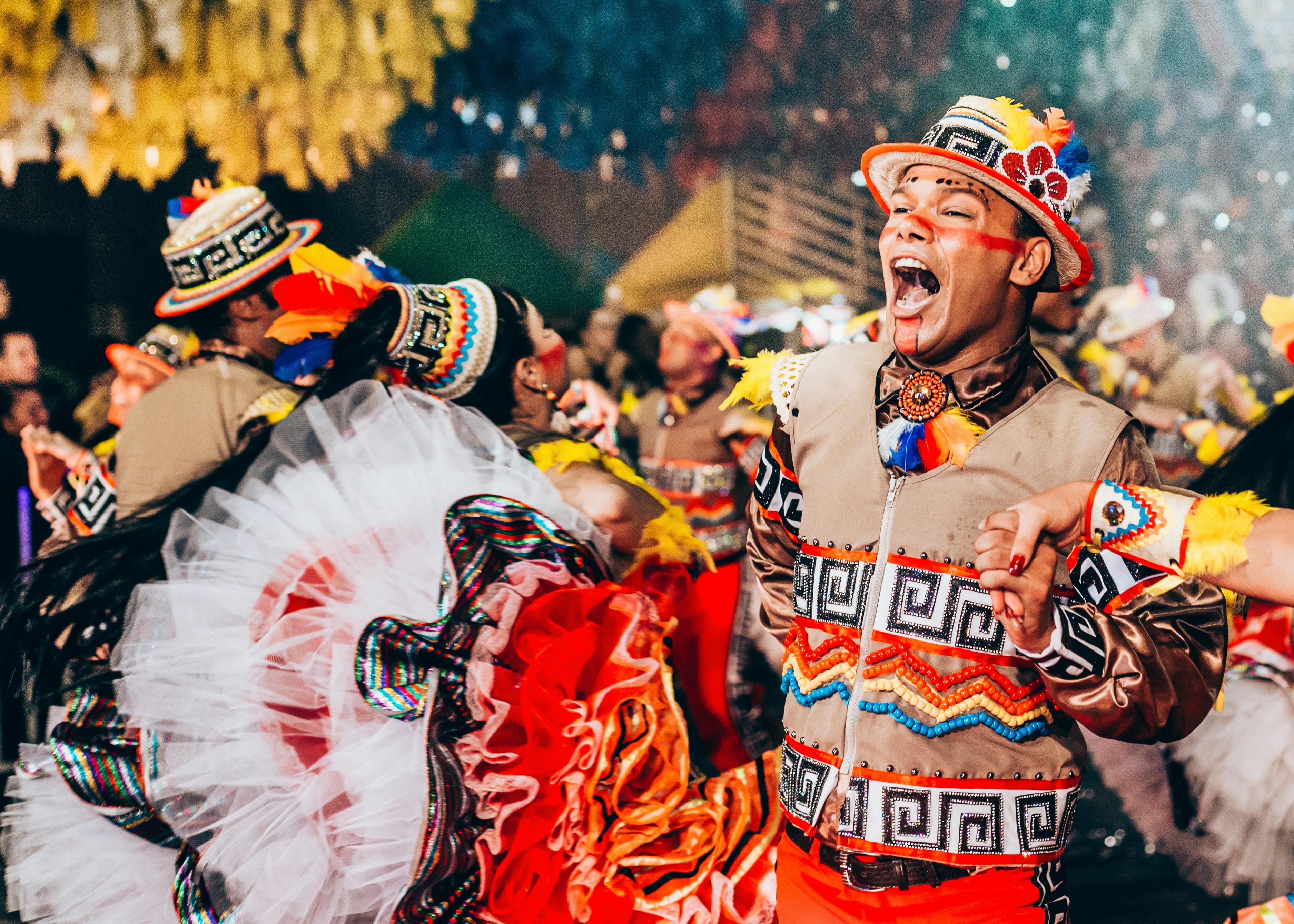 Energetic dance scene at Brazil's traditional festival with colorful costumes and joyful celebrations.